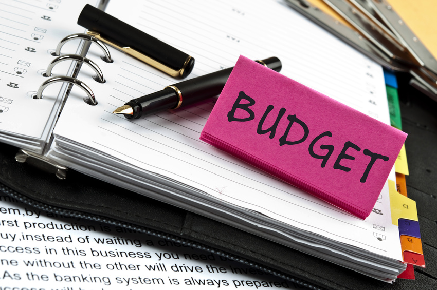 Budget note on agenda and pen