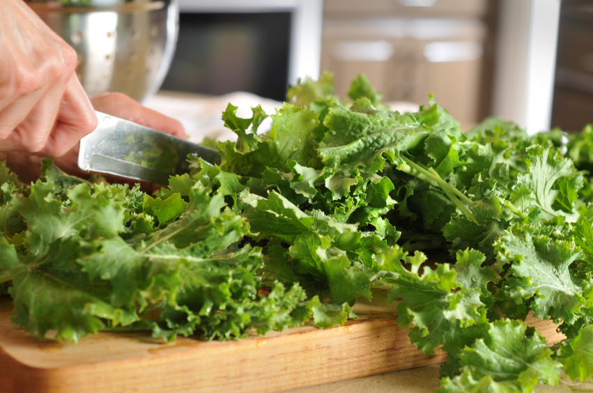 Fresh Siberian Kale on a Cutting Board in a Kitchen